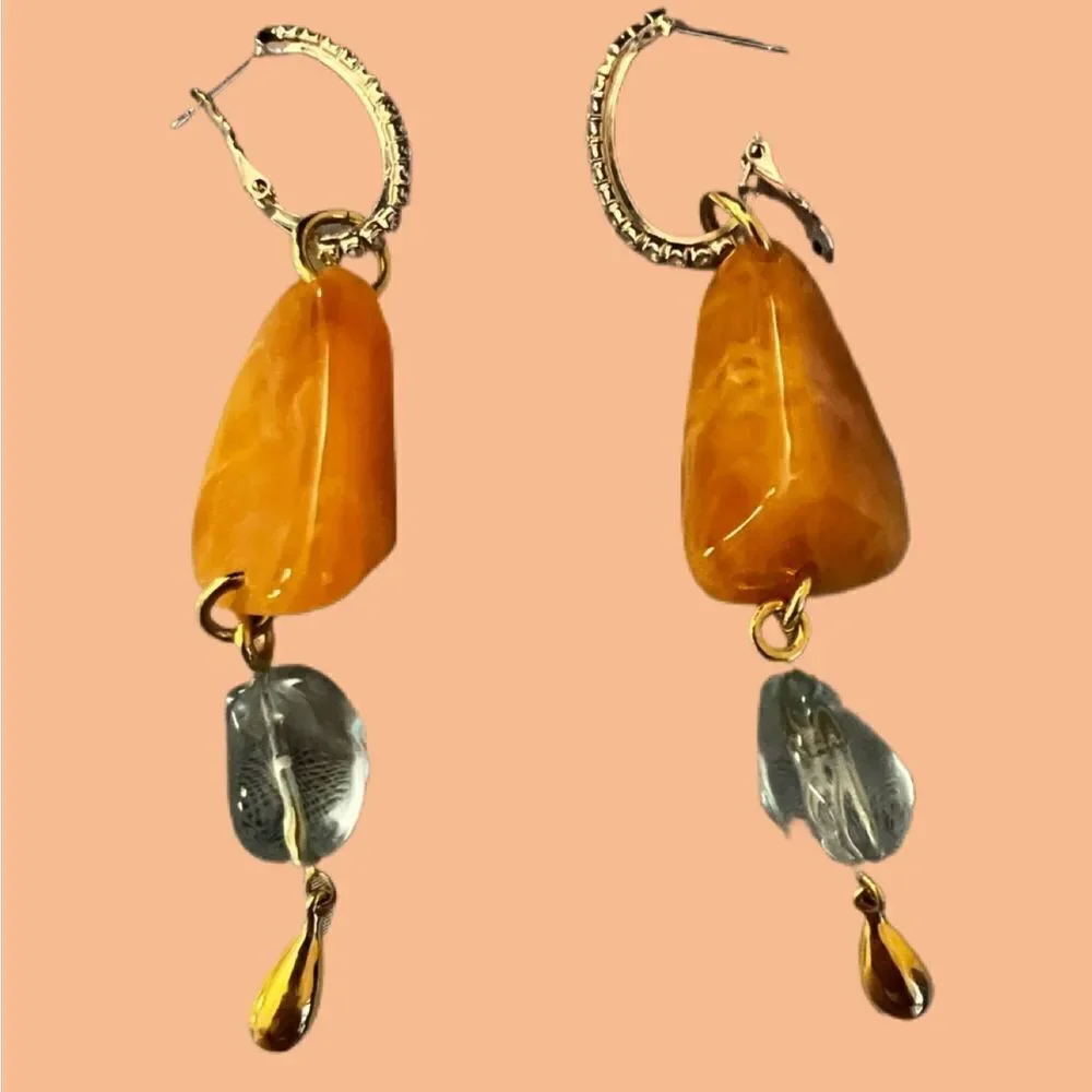 Dangle earrings with 3” drop from ear.